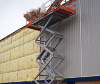 commercial insulation applied to the exterior of a warehouse